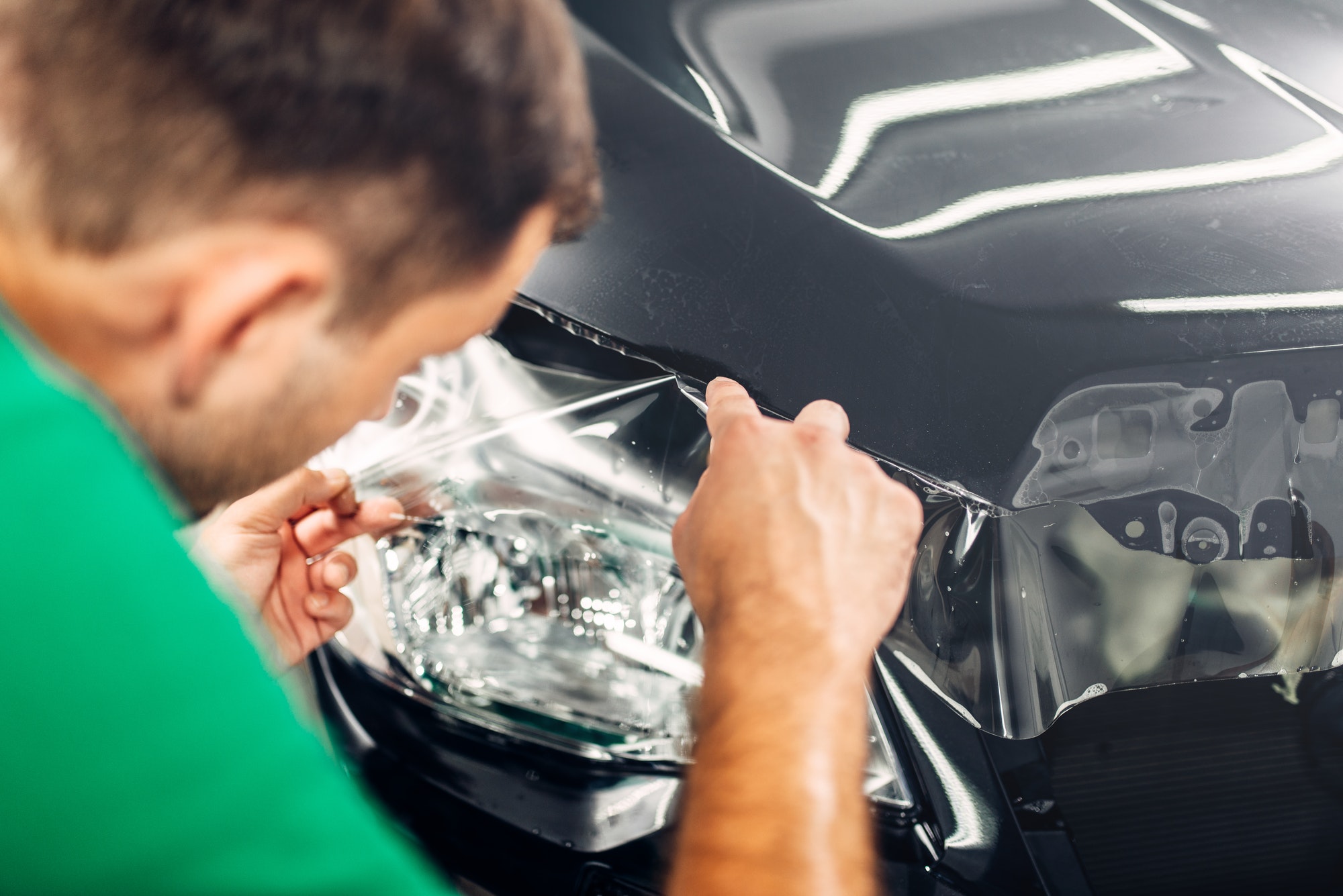 Specialist install car paint protection film